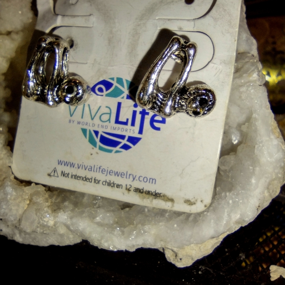 Sloth earrings not worn on tag